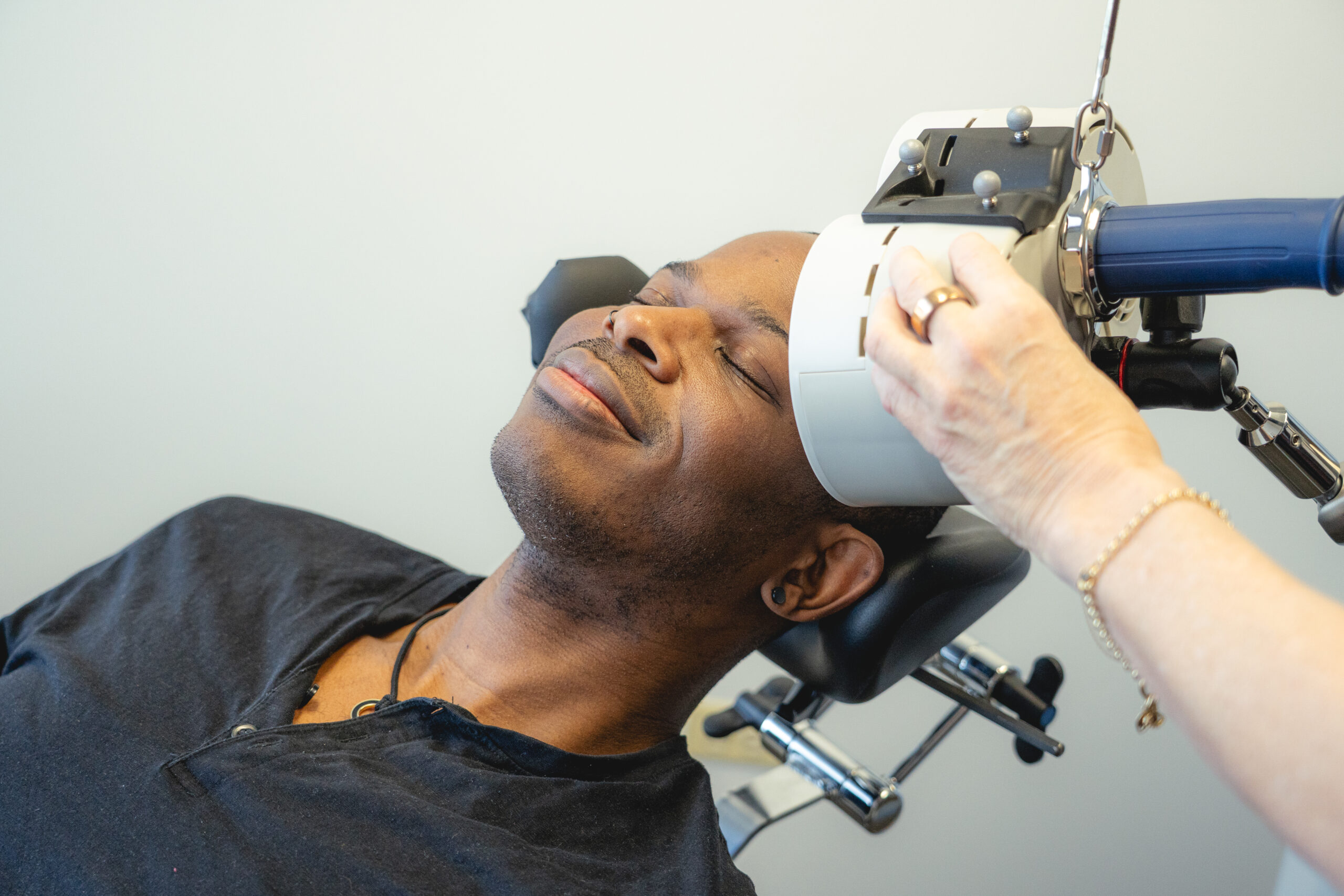Black man getting mind and body treatment
