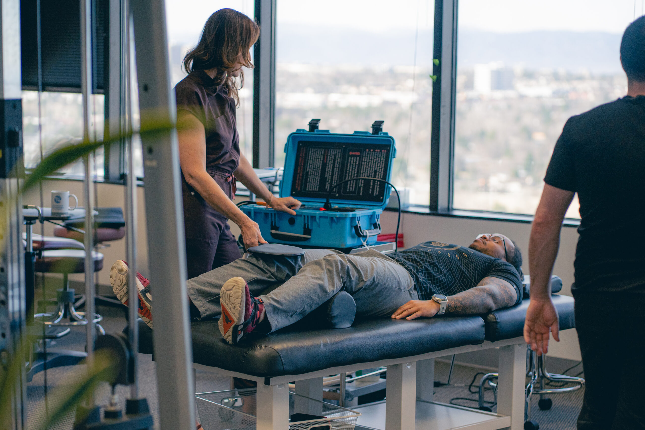 man getting treatment from Dr. Knight