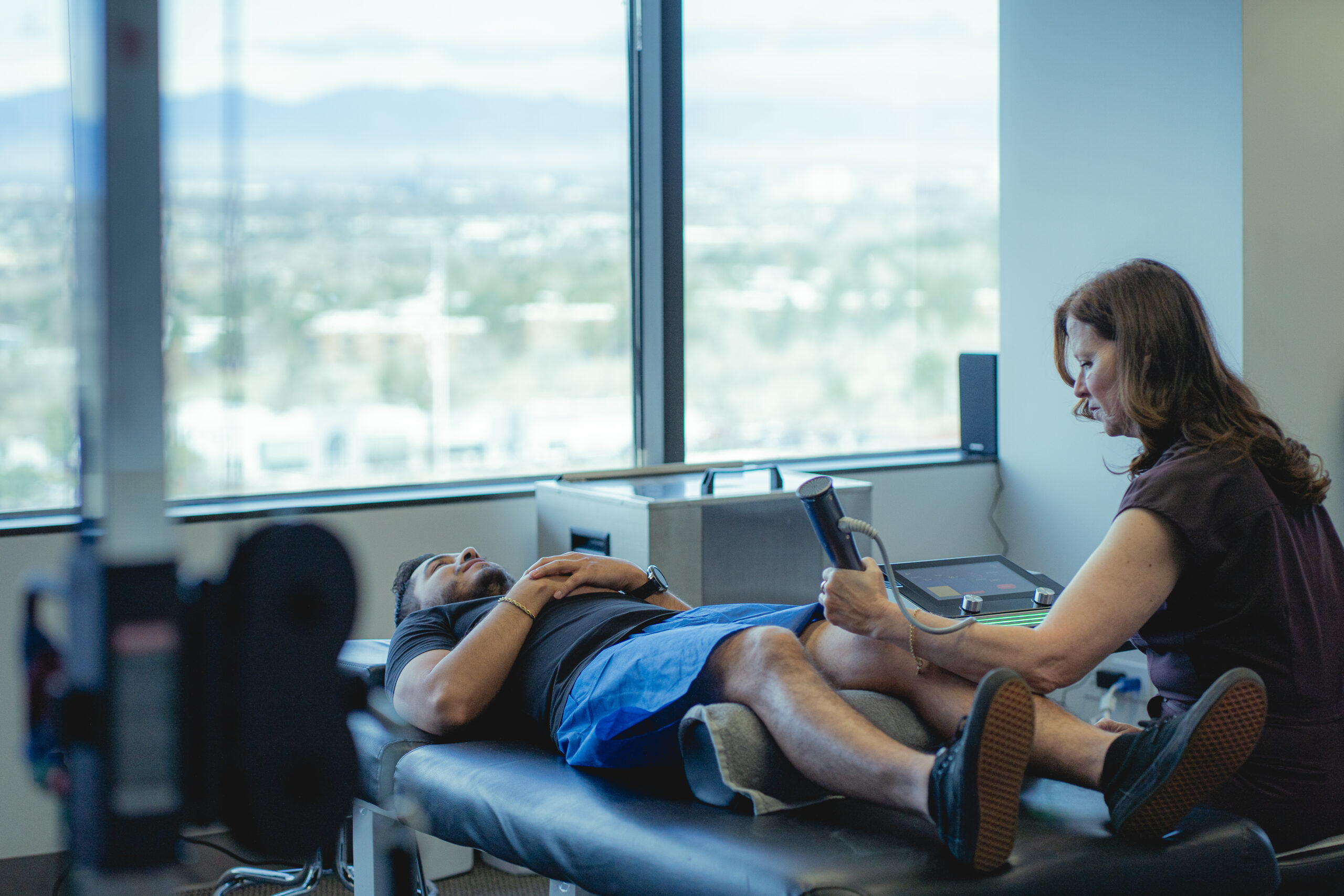 man laying on treatment table
