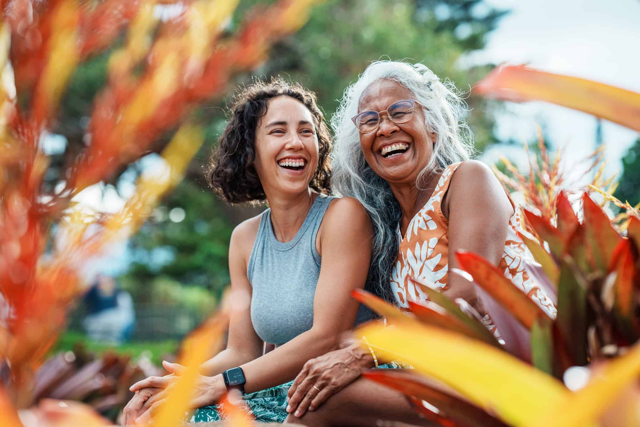 two women smiling and laughing